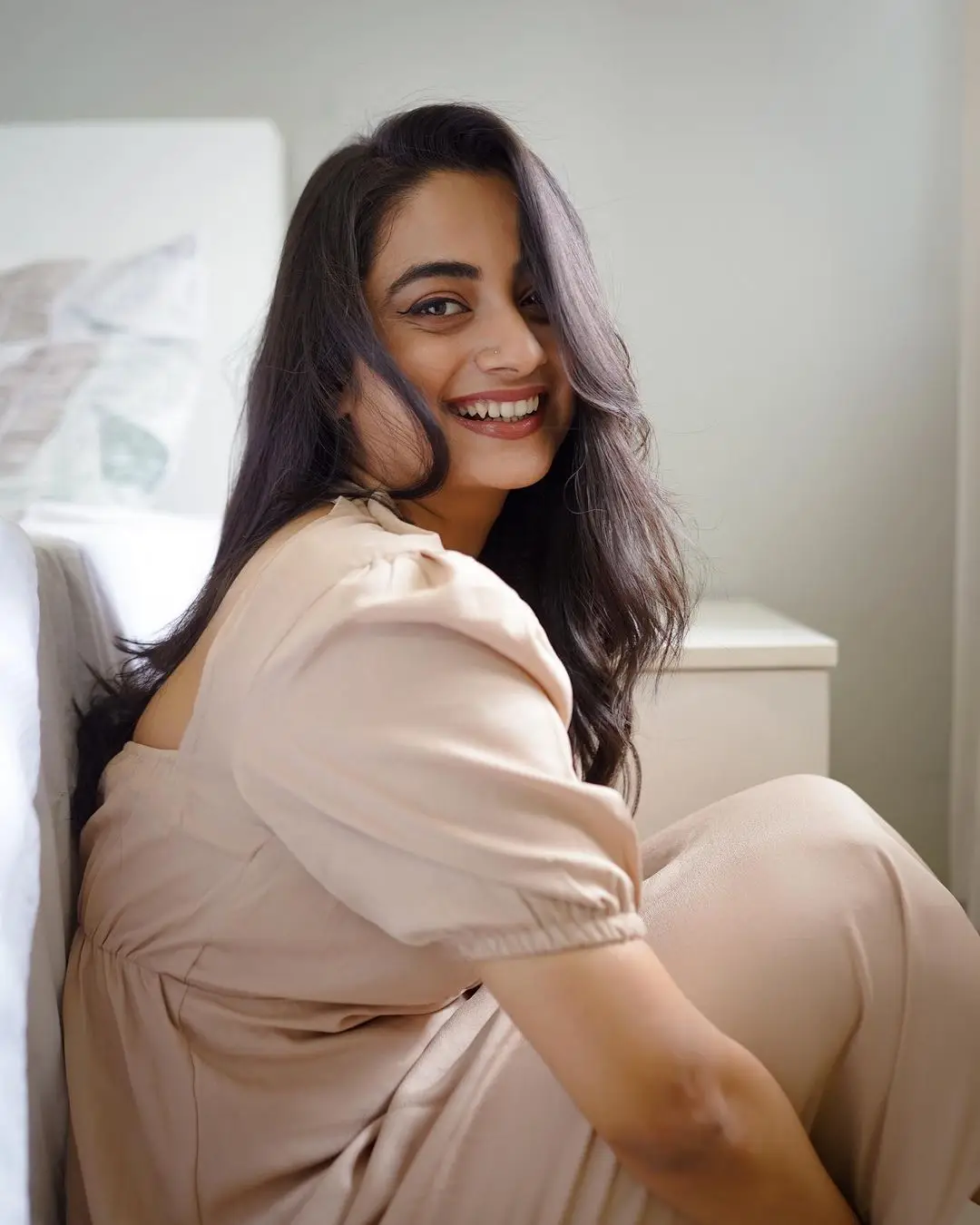 Namitha Pramod Long Hair Stills in White Dress